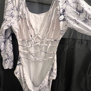 NW/OT White and Black Marble Long Sleeve Bodysuit.
